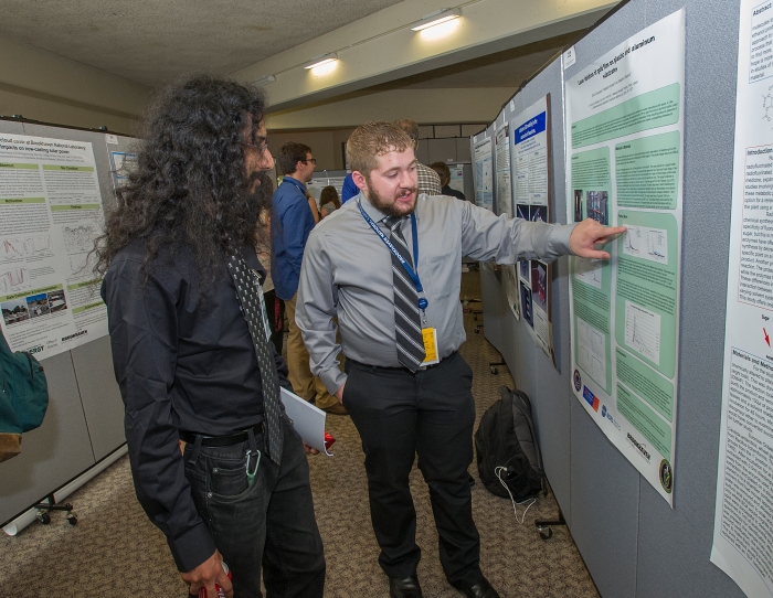 Summer Undergraduate Research Internship (SULI) participant David Cinquegrani shares his research on Brookhaven's Laser Ion Source (LION), which feeds into the Lab's atom smashing Relativistic Heavy Ion Collider (RHIC), with fellow intern Rajeev Seemungal.